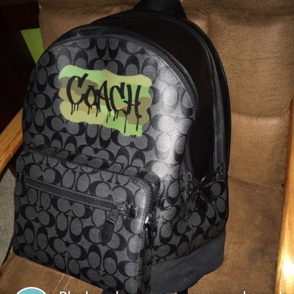 Black and gray monogram coach backpack